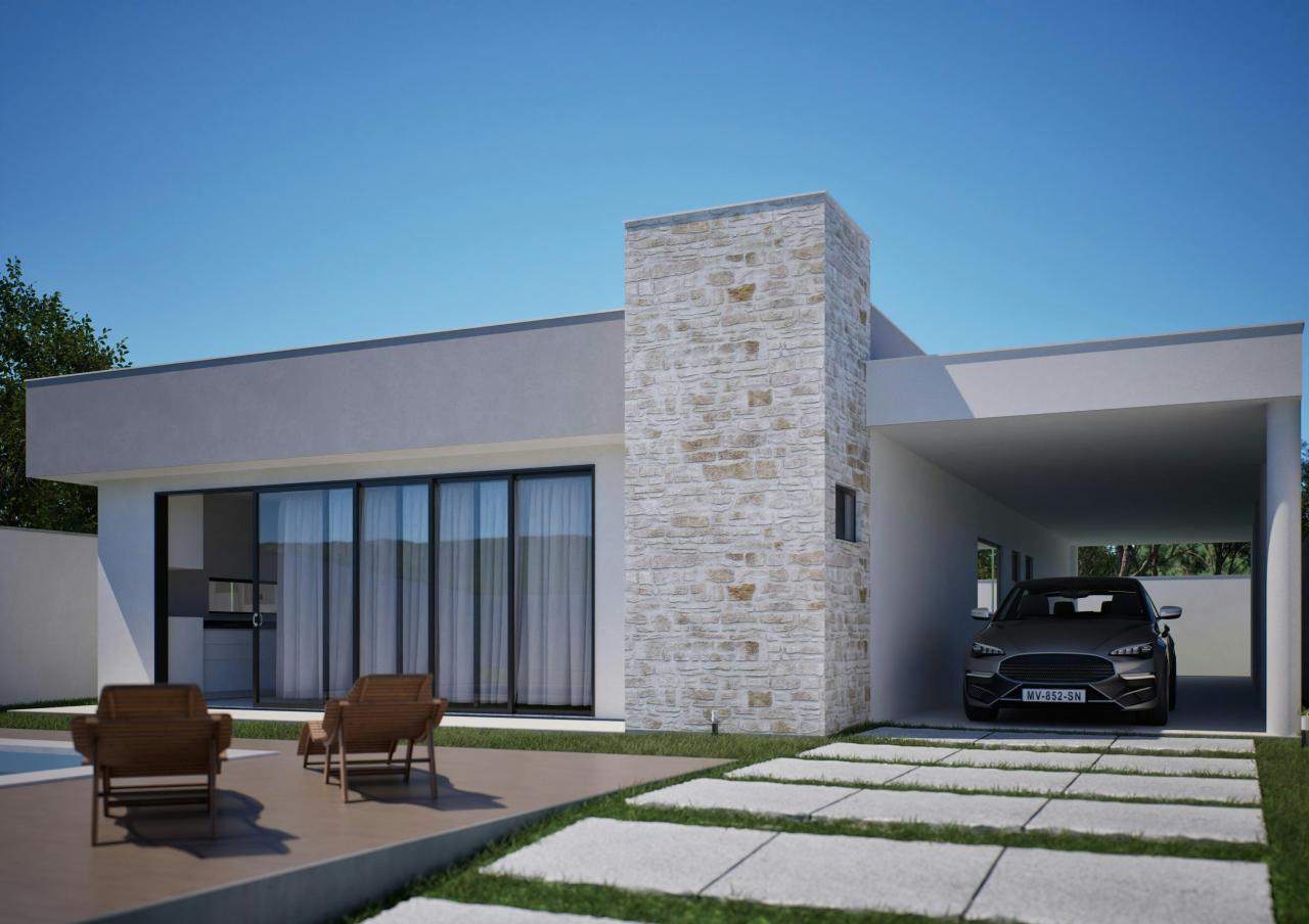 Modern house with car and outdoor seating area.